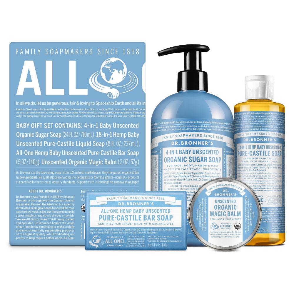 Dr. Bronner’s Baby Gift Set featuring unscented organic sugar soap, liquid castile soap, bar soap, and magic balm against a light blue background.