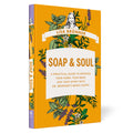 A book titled SOAP SOUL by Lisa Bronner features an illustrated cover with herbs and plants. Text states A Practical Guide to Minding Your Home, Your Body, and Your Spirit with Dr. Bronners Magic Soaps